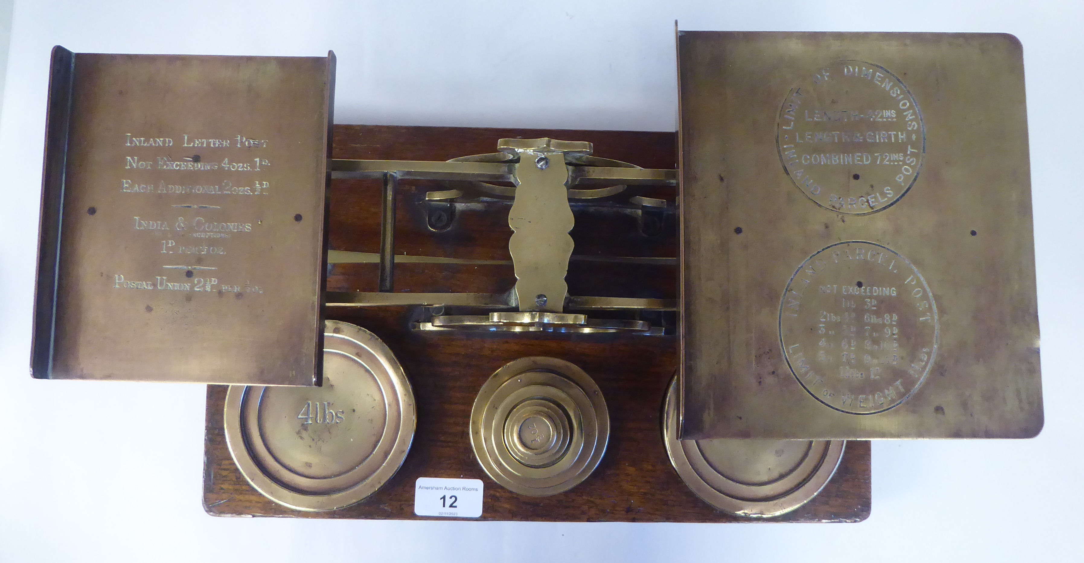 Late Victorian S.Mordan & Co, London, lacquered brass beam balance postal scales, attached to an oak - Image 2 of 9