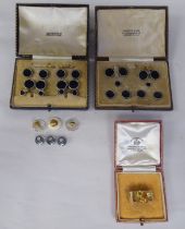 A yellow metal scarf clip; and assorted dress shirt buttons and studs