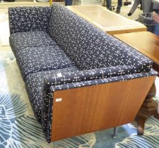 A Herman Miller sofa, designed by Mark Goetz, 'wrapped' in wood veneered panels and upholstered in