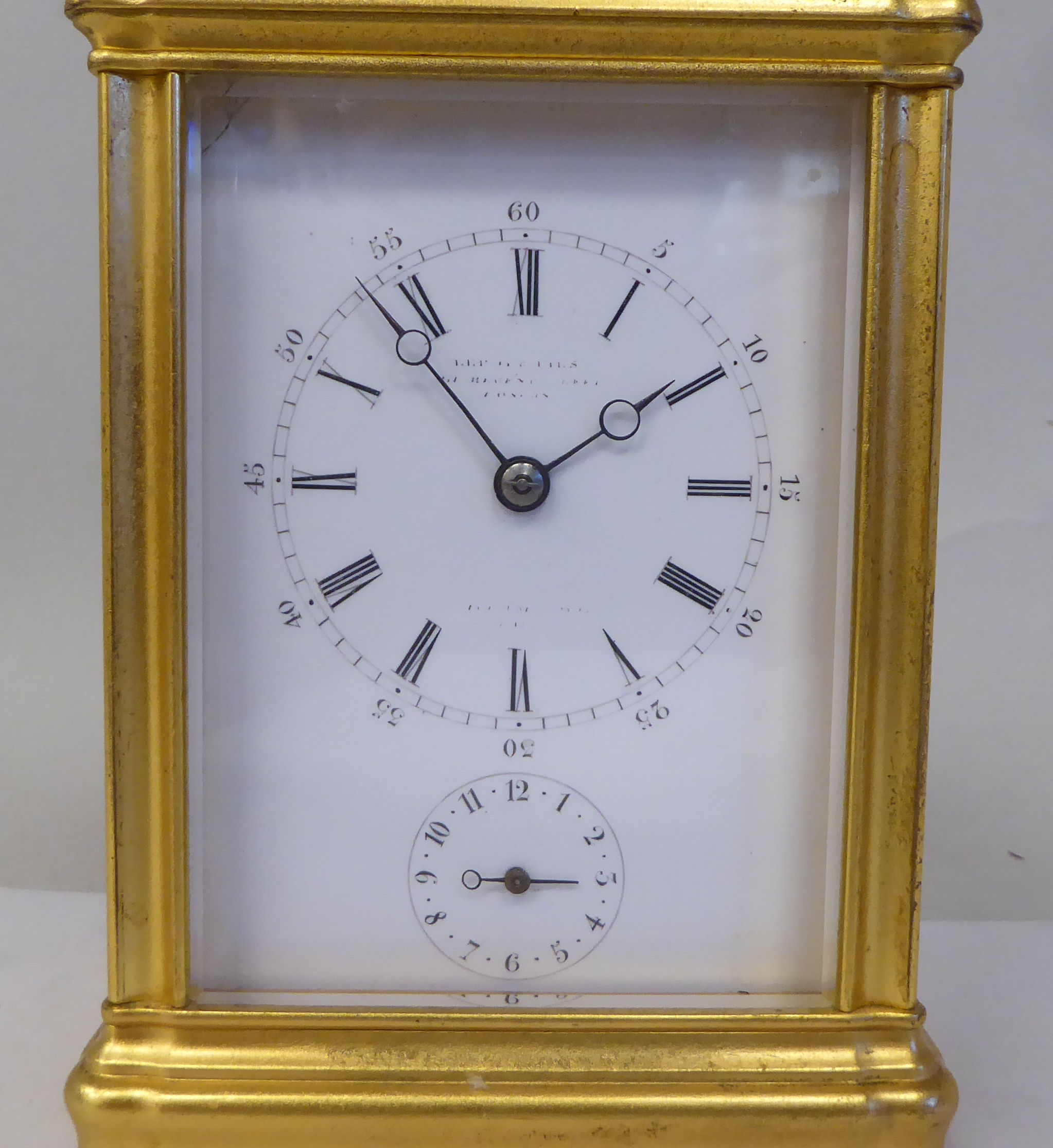 An early 20thC French lacquered brass cased carriage clock with a folding top handle and bevelled - Image 2 of 8