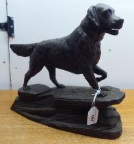 A modern composition figure, a pointing Golden Retriever, on a naturalistic base  12"h