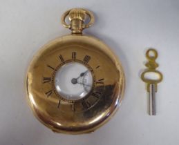 A 9ct gold cased half-hunter pocket watch, the movement faced by a white enamel Roman dial,