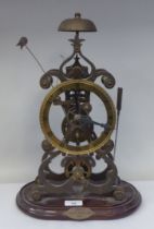 A traditional brass framed skeleton clock, reputed to have been made by Roxroth Apprentices 1985;