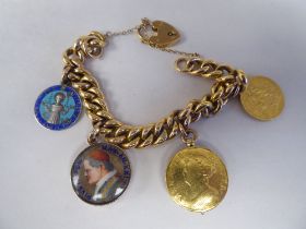 A 9ct gold belcher link charm bracelet: to include a locket; a Victorian sovereign, St. George on