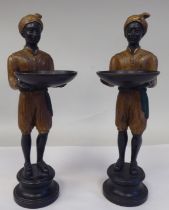 A pair of painted cold cast bronze blackamoor figures, featuring two boys, wearing turbans, each