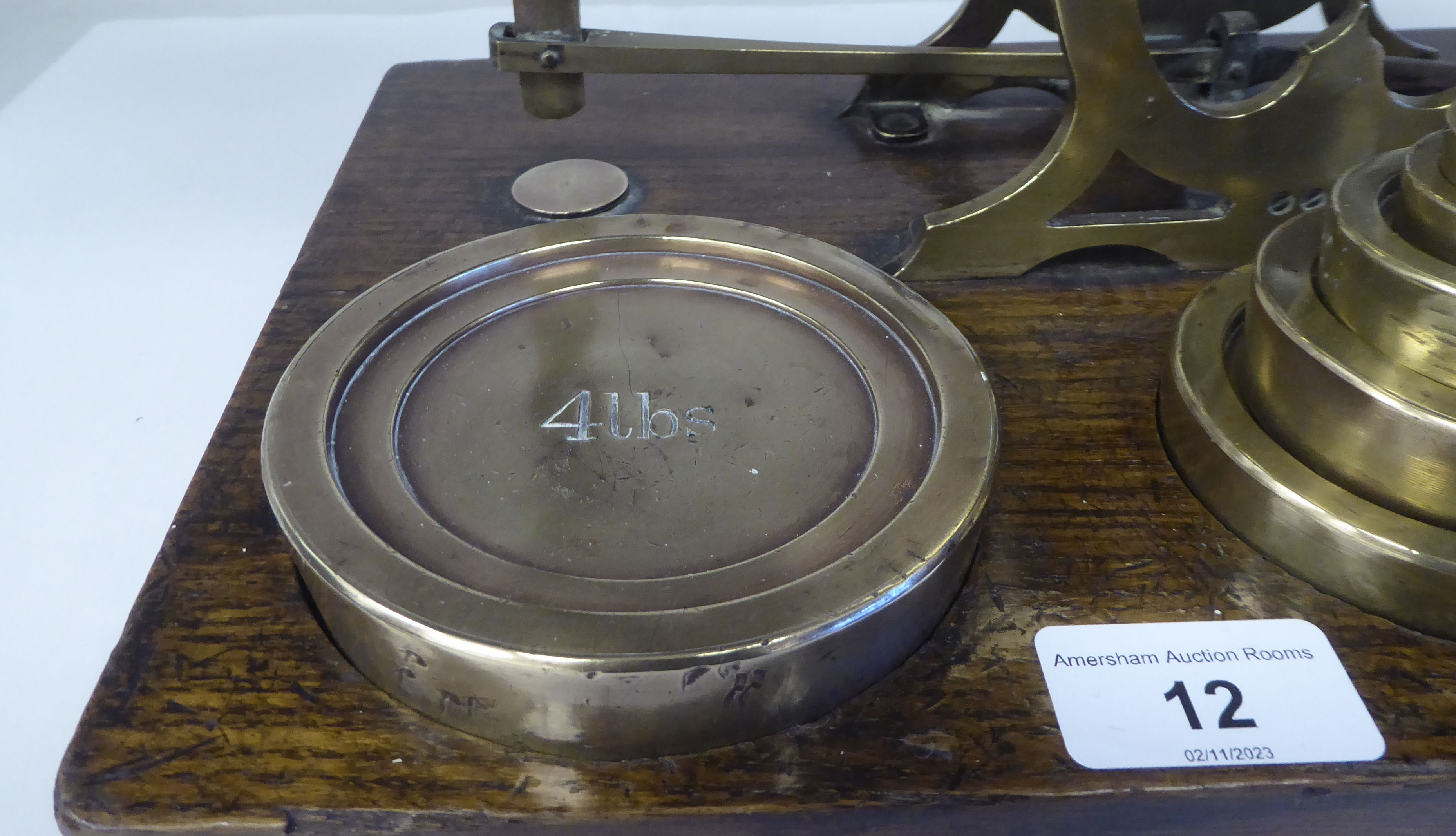 Late Victorian S.Mordan & Co, London, lacquered brass beam balance postal scales, attached to an oak - Image 6 of 9