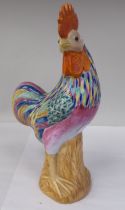 A mid 20thC Chinese porcelain famille rose model cockerel, brightly enamelled in naturalistic tones