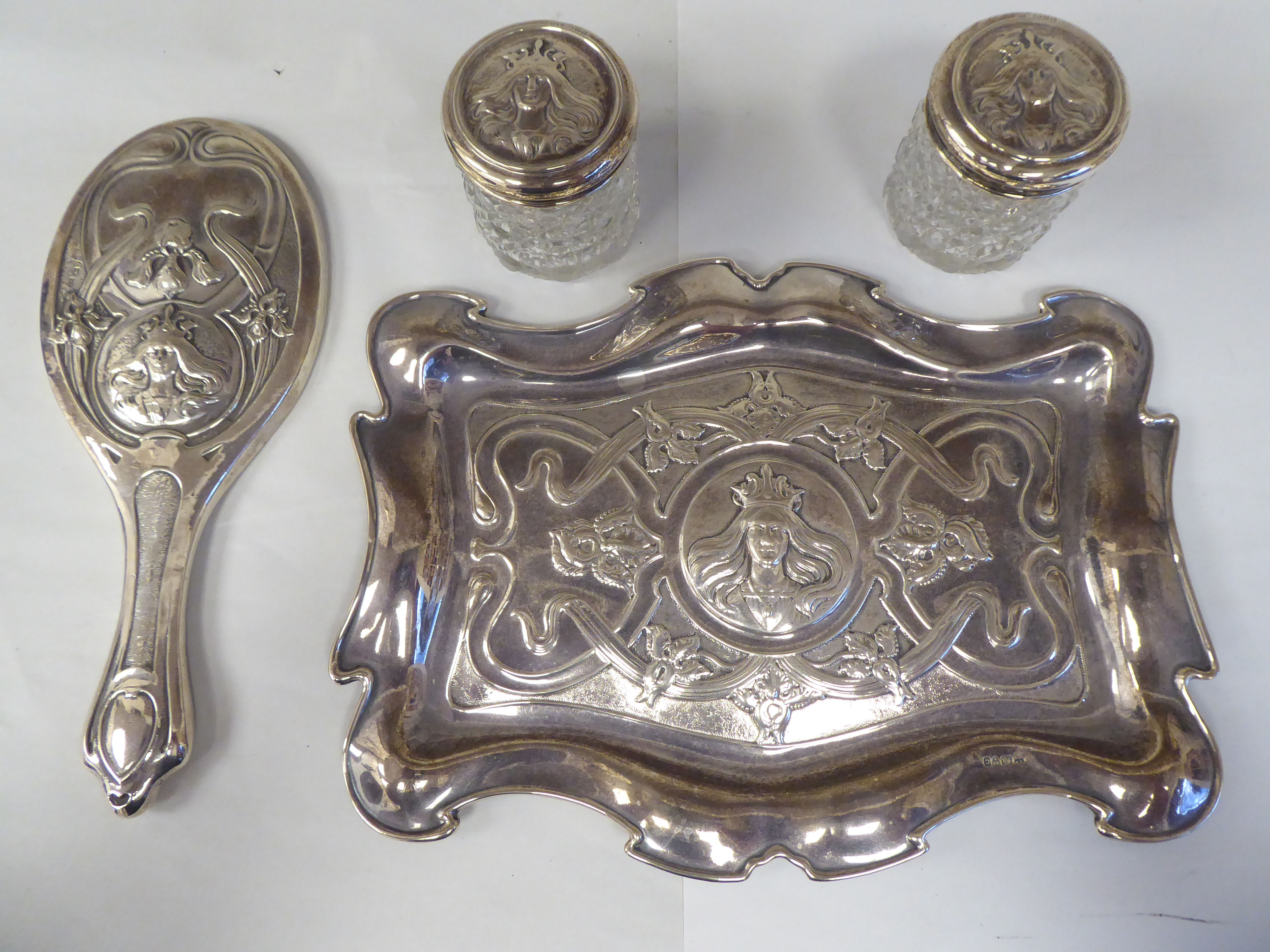 An Art Nouveau period silver four piece dressing table set tray, featuring a maidens crowned - Image 2 of 10