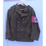 A German NSDAP double breasted 'political' tunic with buttons and epaulettes and a swastika