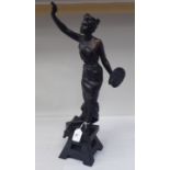 After E Villanis - a cast and patinated standing figure, a classically inspired female artist, on