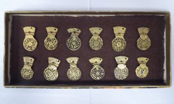 A series of twelve 18th/19thC finely pierced and engraved gilt metal pocket watch balance cocks