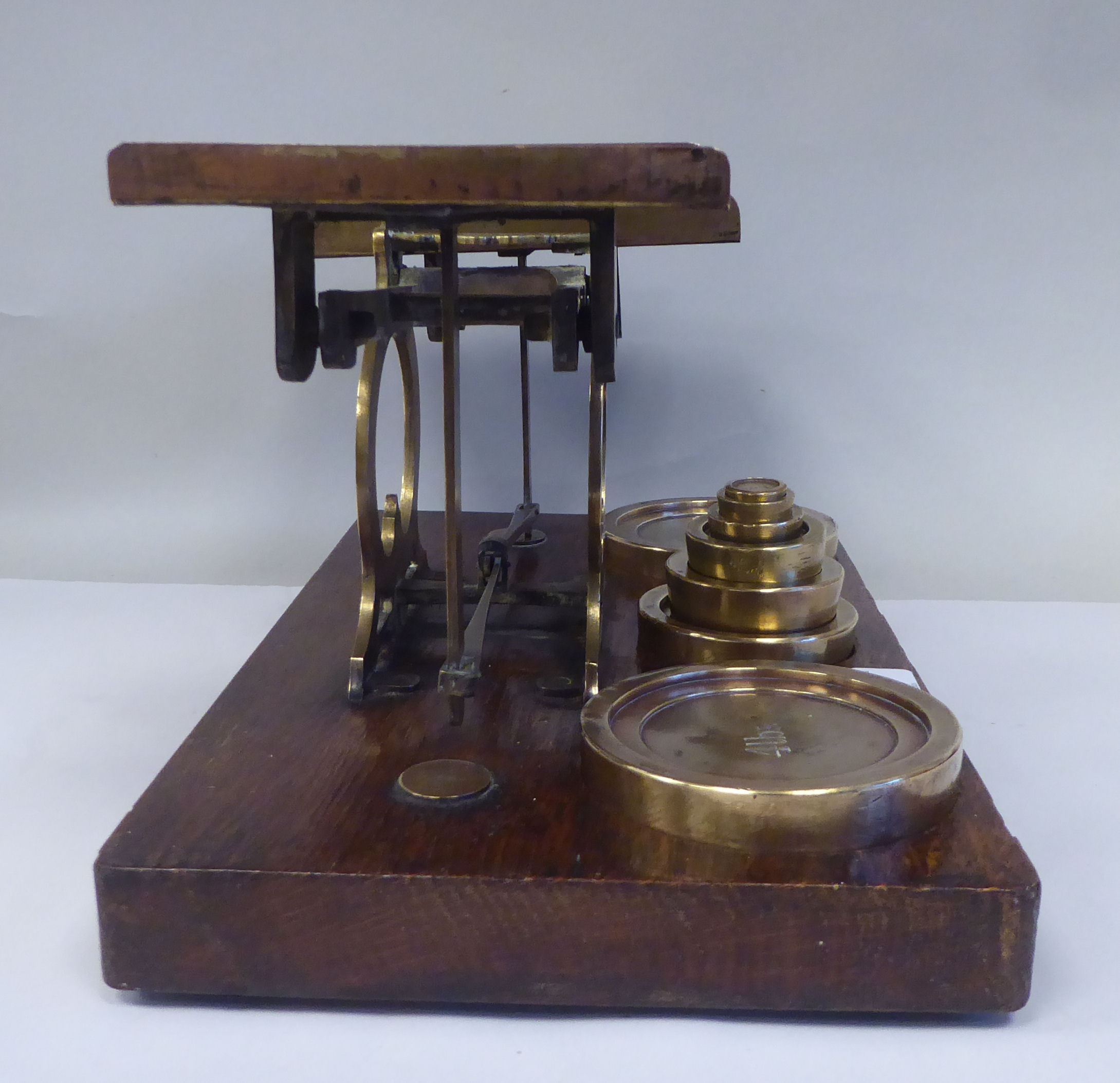 Late Victorian S.Mordan & Co, London, lacquered brass beam balance postal scales, attached to an oak - Image 9 of 9