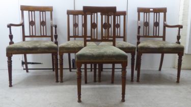 A set of five Edwardian satinwood inlaid mahogany framed dining chairs, each with a splat-back and