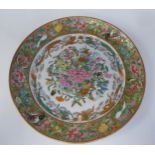 A 19thC Chinese porcelain dish, decorated in famille rose and gilding with fruit, insects and