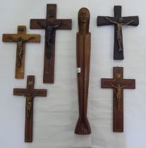 Five crucifix of varying sizes  largest 15"h; and a carved wooden statue 'The Madonna'  22.5"h