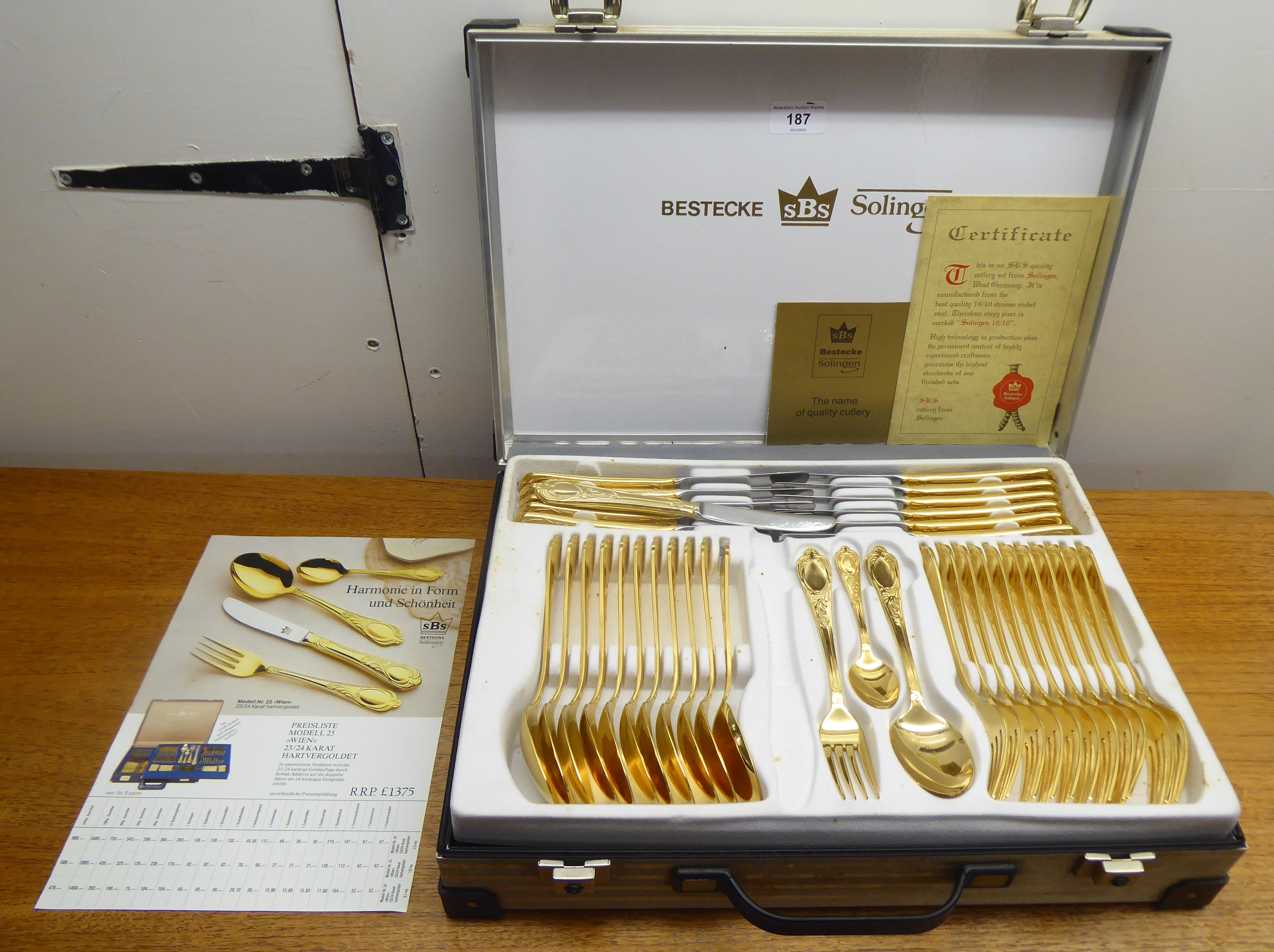 A Bestecke Solingen gold plated canteen of cutlery
