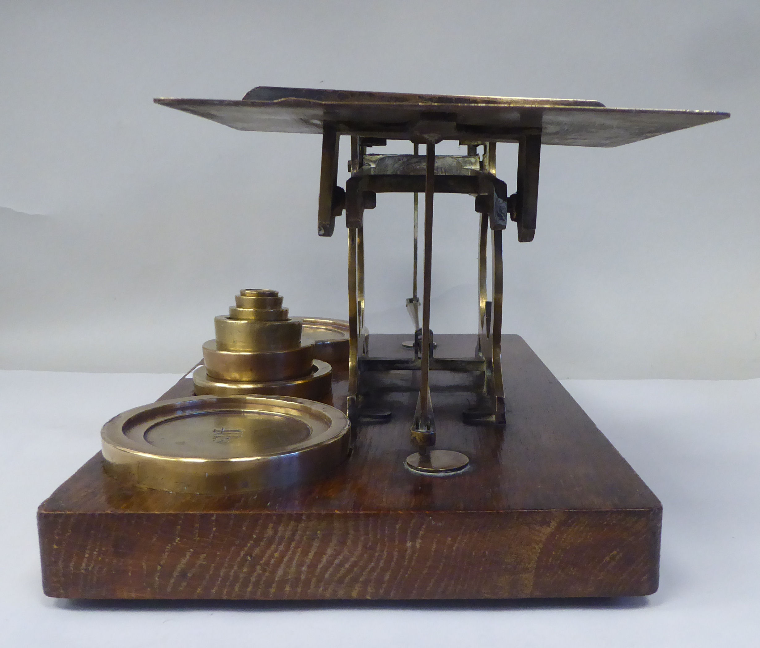 Late Victorian S.Mordan & Co, London, lacquered brass beam balance postal scales, attached to an oak - Image 7 of 9