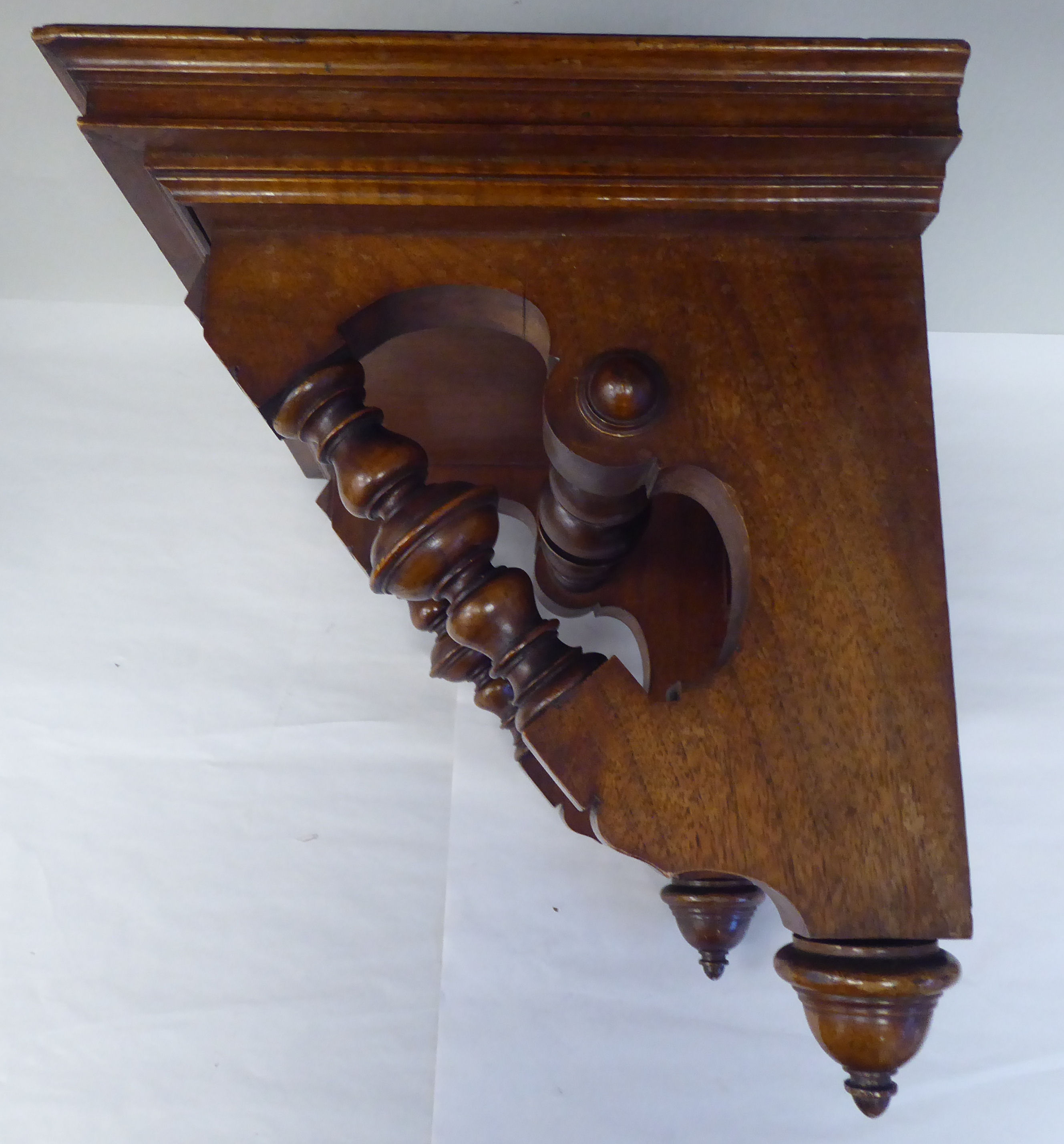 A late Victorian walnut clock bracket, the platform top over a series of elaborately turned supports - Image 4 of 4