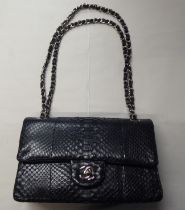 A black snakeskin effect handbag