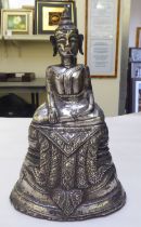 A white coloured metal covered seated Buddha  10.5"dia