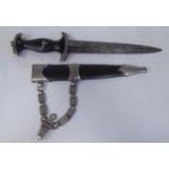 A Third Reich era 'chained' SS dress dagger with a shaped handgrip, nickel-silver mounts and a