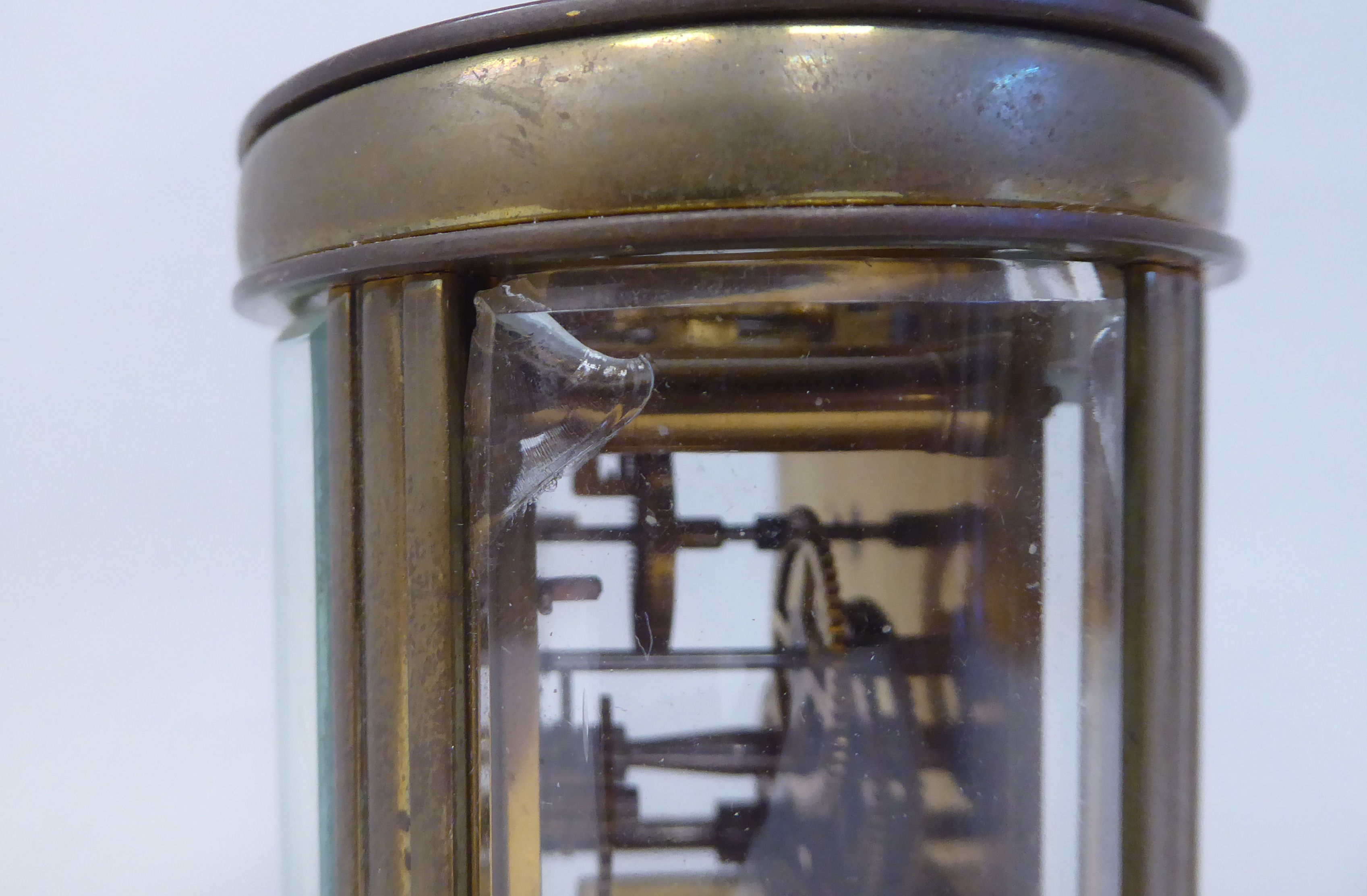 An early 20thC French oval brass cased carriage timepiece with bevelled glass panels and a folding - Image 3 of 11