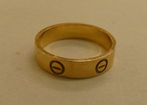 An 18ct gold Cartier ring  no.8978
