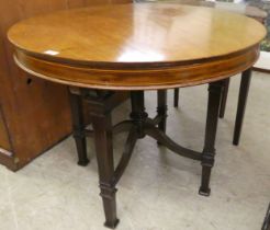 An Edwardian satinwood inlaid mahogany centre table, raised on square legs  30"h  35"dia