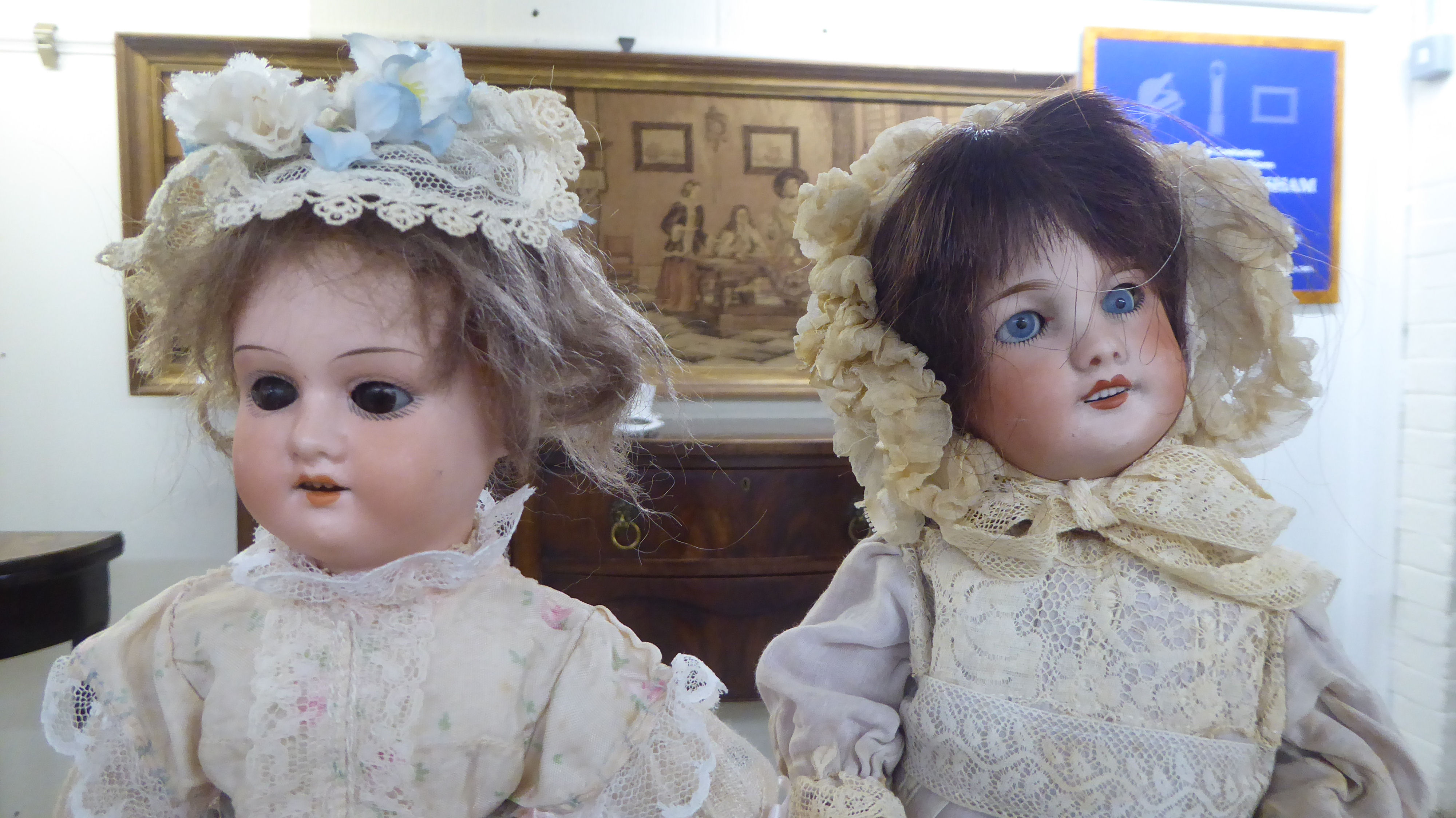 Three bisque head dolls: to include an early 20thC example with painted features, on a jointed - Image 4 of 6