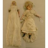 Two late 19thC wax head dolls, each with a fabric body and partial limbs  14" and 17"h