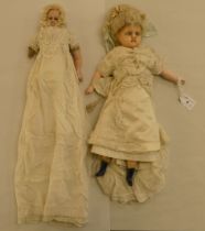 Two late 19thC wax head dolls, each with a fabric body and partial limbs  14" and 17"h