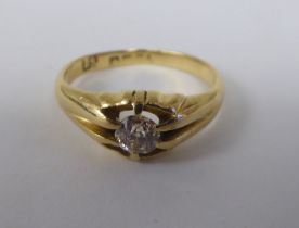 An 18ct gold gentleman's diamond set gypsy ring
