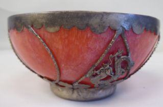 A 20thC Chinese pink jadeite bowl, set in a white metal frame  4.25"dia