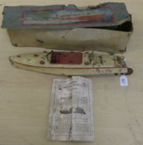 A Hornby tinplate clockwork model of a Racer III speed boat  17"L