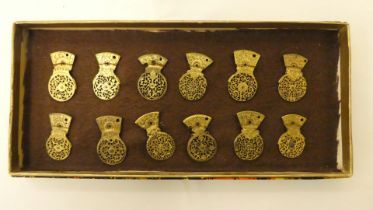 A series of twelve 18th/19thC finely pierced and engraved gilt metal pocket watch balance cocks