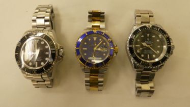 Three stainless steel cased and strapped wristwatches