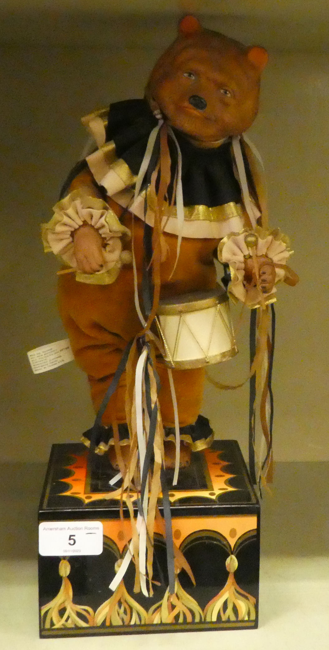 An Enesco Drummer bear, designed by Faith Wick, on a music box plinth  no.358  16"h