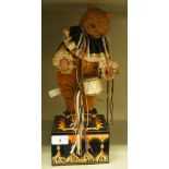 An Enesco Drummer bear, designed by Faith Wick, on a music box plinth  no.358  16"h