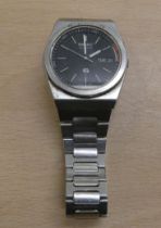 A Seiko Alarm Quartz stainless steel bracelet watch, faced by a baton dial