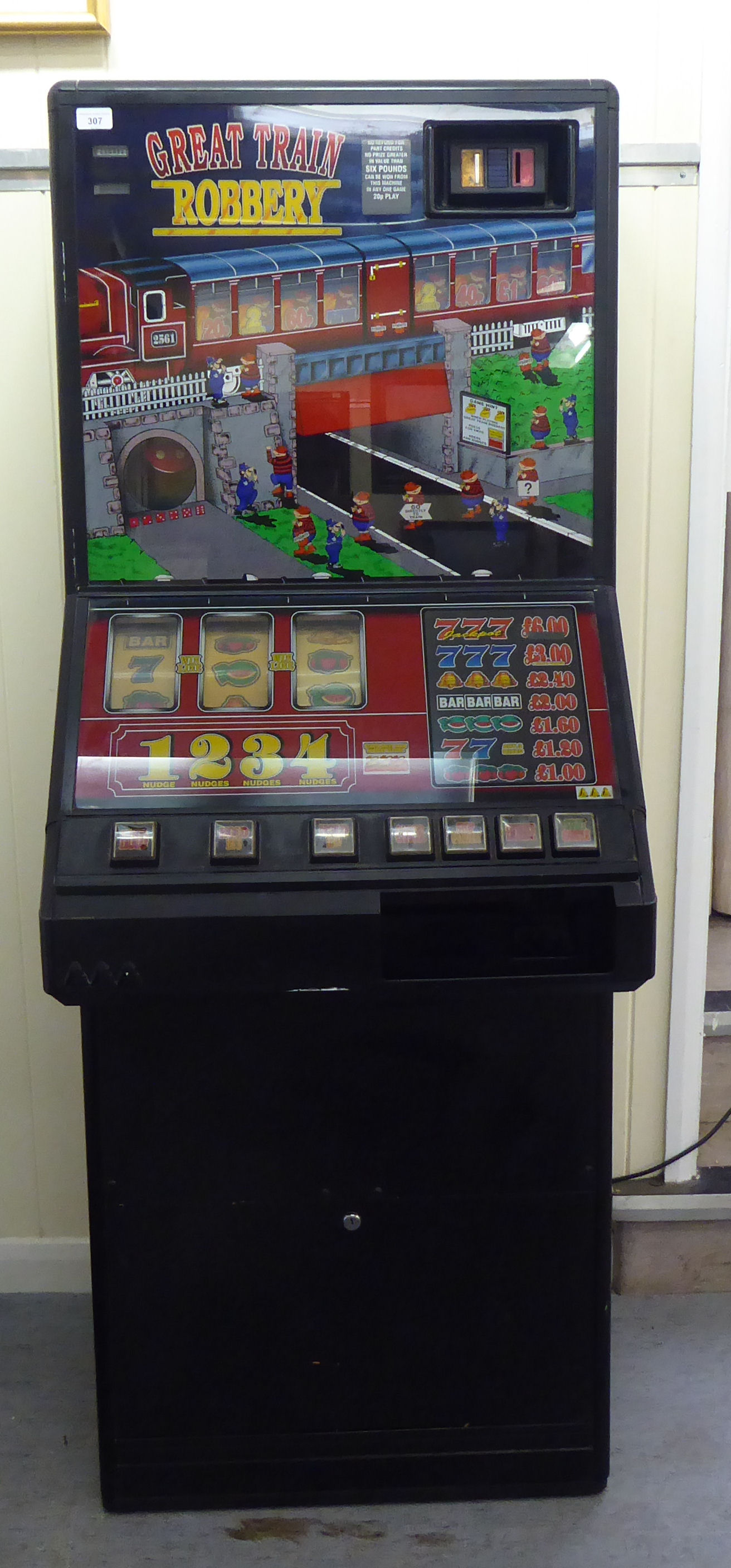 A circa 1980s pub electrically powered 'Great Train Robbery' themed fruit machine  66"h  25"w  (sold