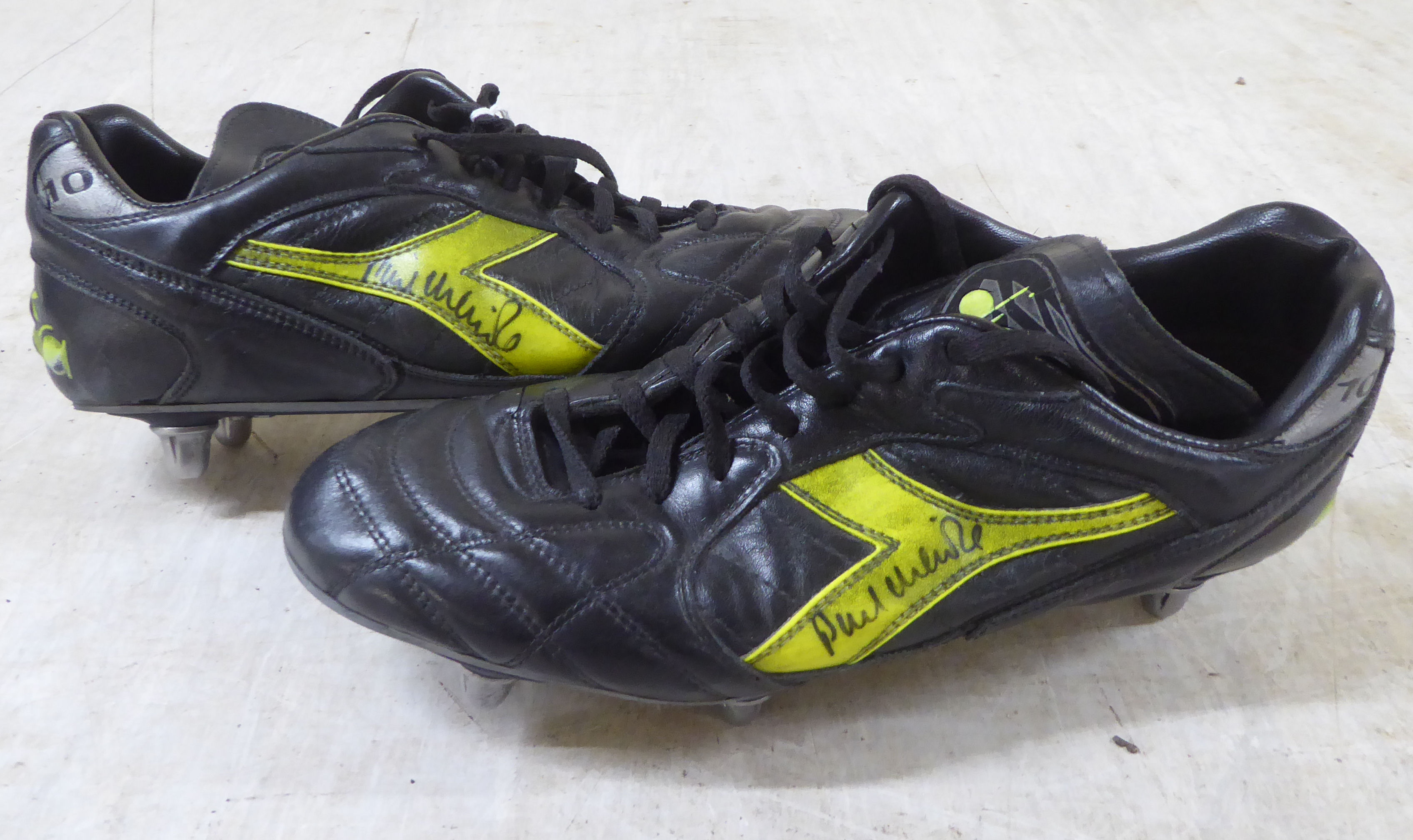 A pair of Diadora 10 football boots, signed by Phil Neville  Size 9.5