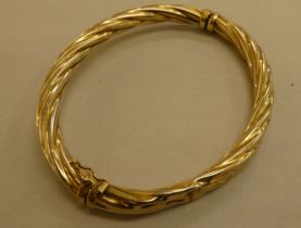 A 9ct gold hollow ropetwist effect bangle