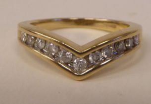 A 9ct gold diamond set wishbone design ring