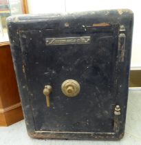 A Griffiths cast iron floor safe  24"h  20"w  16"deep (combination not given)  (Our staff cannot