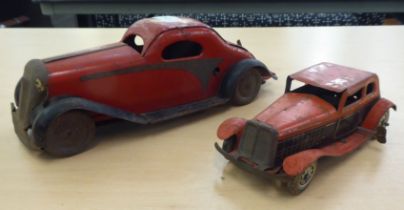 Two British made, painted tinplate, vintage clockwork operated toy cars