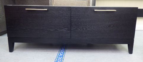A modern black ash finished, two drawer hi-fi/television stand with brushed steel bar handles  16"h
