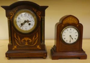 Two dissimilar Edwardian mahogany cased mantle clocks, one faced by an Arabic dial  11.75"h; the