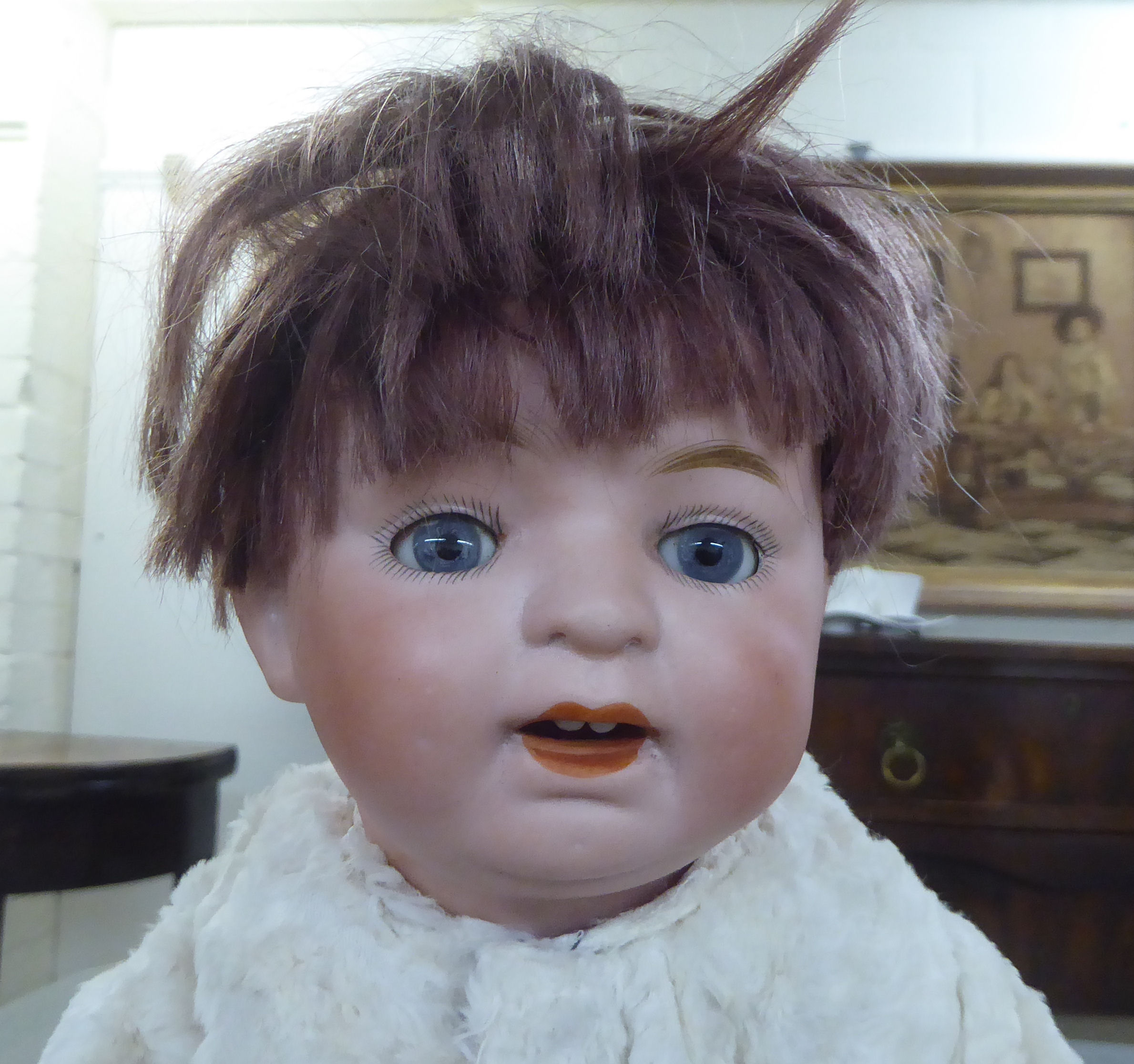 Three bisque head dolls: to include an early 20thC example with painted features, on a jointed - Image 2 of 6