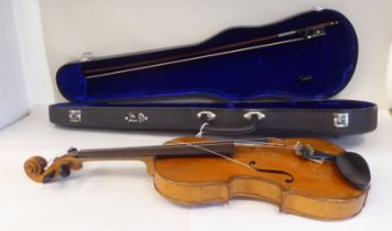 A violin with a two-part back and purfled edge  14"L with a bow, in a later, hard carrying case