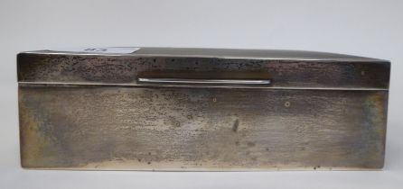 A silver cigarette box with a cedar lined interior  Birmingham 1937  2"h  6.5"w